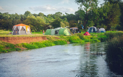 Riverside camping pitch, tent camping at Wild Canvas Camping, UK